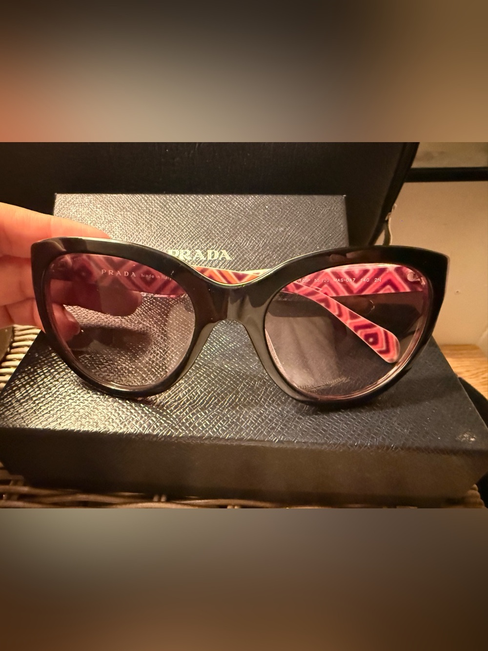 Prada Women's Black Sunglasses with Pink Patterned Temples